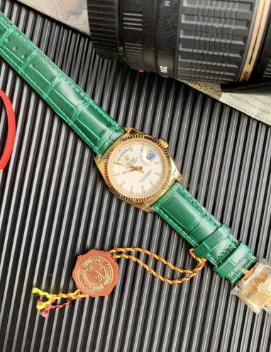 Rolex Gold Watch with Green Leather Strap