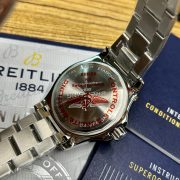 9-877